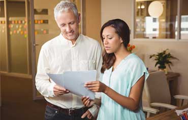 Client inquiring about IT hardware services from experts.